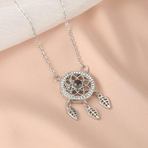 Dreamcatcher necklace projecting meaningful memories with a unique style.